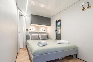 The Homeboat Company Sant'Elmo-Cagliari客房内的一张或多张床位
