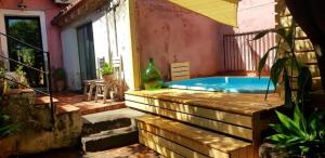 a patio with a hot tub in a house at La Siciliana in Acireale