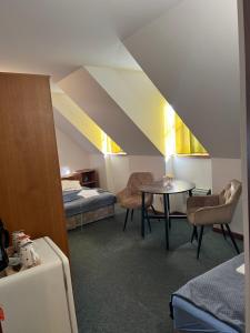 Postel nebo postele na pokoji v ubytování Apartmány BAROKO