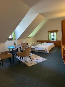 Postel nebo postele na pokoji v ubytování Apartmány BAROKO