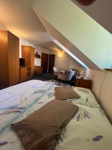 Postel nebo postele na pokoji v ubytování Apartmány BAROKO