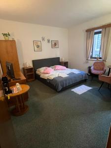 Postel nebo postele na pokoji v ubytování Apartmány BAROKO