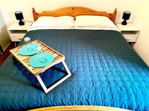 Ένα ή περισσότερα κρεβάτια σε δωμάτιο στο Casa Bucaneve +10 φωτογραφίες