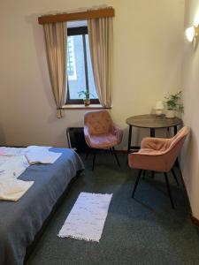 Postel nebo postele na pokoji v ubytování Apartmány BAROKO