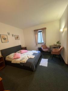 Postel nebo postele na pokoji v ubytování Apartmány BAROKO