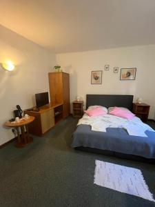Postel nebo postele na pokoji v ubytování Apartmány BAROKO