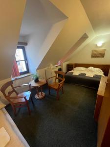 Postel nebo postele na pokoji v ubytování Apartmány BAROKO