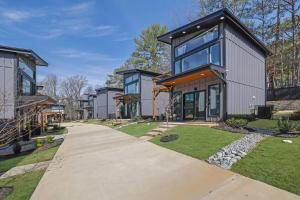 a large house with a walkway leading to it at The Business Bungalow-5 Mins From Airport in Atlanta