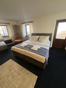 Postel nebo postele na pokoji v ubytování Apartmány BAROKO