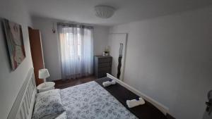Postel nebo postele na pokoji v ubytování Apartman Darija