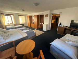 Postel nebo postele na pokoji v ubytování Apartmány BAROKO
