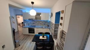 Kuchyň nebo kuchyňský kout v ubytování Apartman Darija
