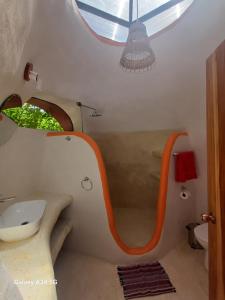 Ένα μπάνιο στο Casa Pitufo