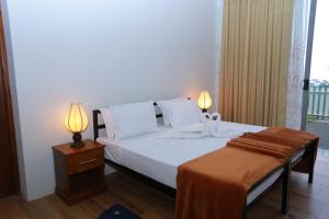 Letto o letti in una camera di Tara Waterfall