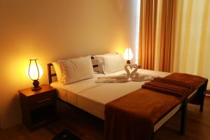 Letto o letti in una camera di Tara Waterfall