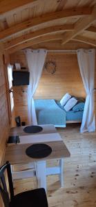 Posteľ alebo postele v izbe v ubytovaní Roulotte la Bohême est son Spa en Baie de Somme