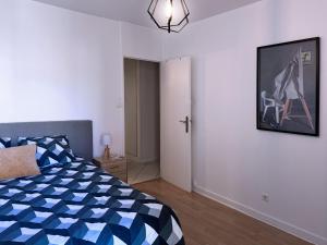 Posteľ alebo postele v izbe v ubytovaní Appartement Chopin au coeur de Nancy