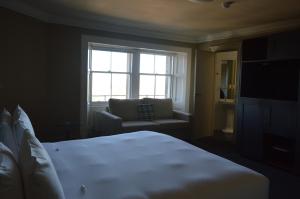 Postel nebo postele na pokoji v ubytování B+B Edinburgh