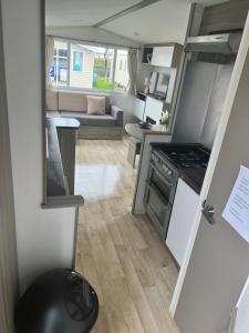 Kuhinja oz. manjša kuhinja v nastanitvi Lyons Winkups holiday park ll22 9EL