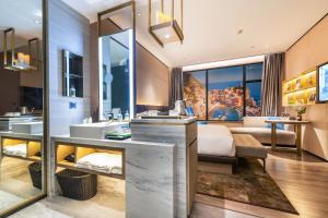 Posezení v ubytování Echarm Plus International Hotel Ouzhuang Metro Station Branch - Free Deliver Service to Canton Fair Complex During Canton Fair Period