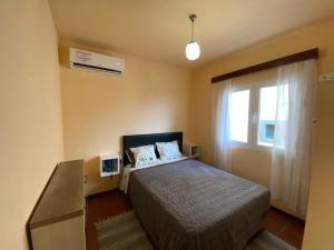Uma cama ou camas num quarto em Casa do Arco