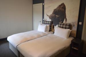 Postel nebo postele na pokoji v ubytování B+B Edinburgh