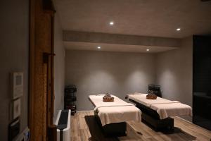 a room with two beds in a room at Luxury Premium Finese in Golem