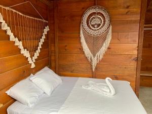Postel nebo postele na pokoji v ubytování MAYAB Holbox