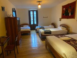 Postel nebo postele na pokoji v ubytování Mía Leticia B&B