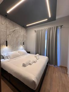 Eterna Suites Roma客房内的一张或多张床位