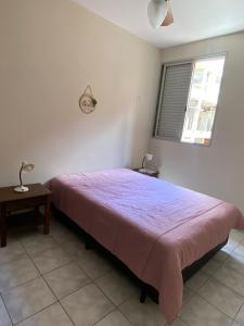 Postel nebo postele na pokoji v ubytování Apartamento no Guarujá