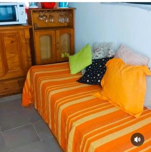 En eller flere senge i et værelse på Descansar en Dolores