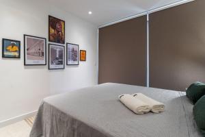 Ένα ή περισσότερα κρεβάτια σε δωμάτιο στο Apt Aconchegante | Piscina, Sauna e Metrô 350m +28 φωτογραφίες