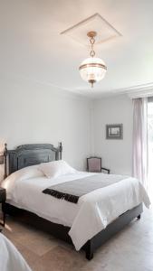 Hotel Alameda Grand客房内的一张或多张床位