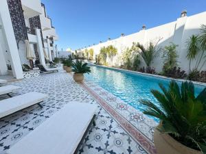 Bazén v ubytování Arаbian Suites by Imperial nebo v jeho okolí