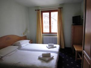 Postel nebo postele na pokoji v ubytování Hotel Residence Valverde