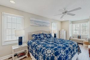 a bedroom with a bed and a ceiling fan at Town of Bethany Beach -116 Oakwood St in Bethany Beach