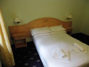 Postel nebo postele na pokoji v ubytování Hotel Residence Valverde