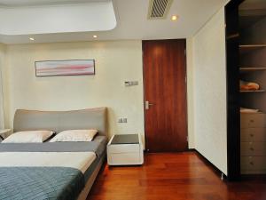 Mangrove Bay Riverside Hill Riverview B&Bl紅樹灣河畔山河景民宿l豪華五房六床高層山景河景l離華發商都商場和港珠澳大橋及拱北澳門關口10分鐘l離橫琴長隆王國25分鐘l樓下北山古城食街客房内的一张或多张床位