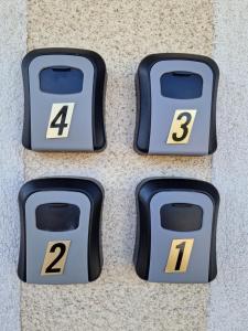 four numbers sitting on the floor at Kleine Zimmer in Gästehaus in Feldkirch