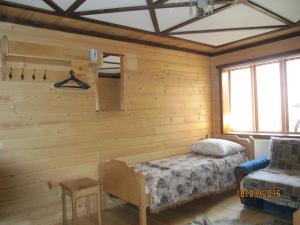 Ένα ή περισσότερα κρεβάτια σε δωμάτιο στο Sadiba Pid Skeleyu