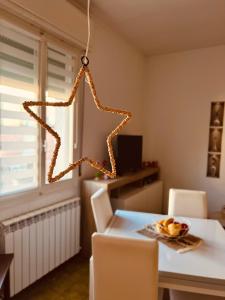 a room with a table and a star light at Villa Cristina in Medicina +17 photos