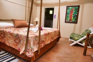 A bed or beds in a room at Strawberry Fields Together