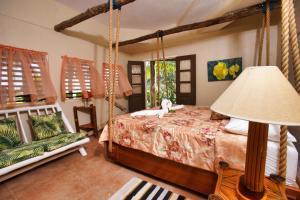 A bed or beds in a room at Strawberry Fields Together