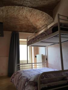 Un ou plusieurs lits superposés dans un hébergement de l'établissement B&B Al Vec Licinsi'