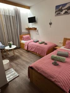 Postel nebo postele na pokoji v ubytování Pension INGE