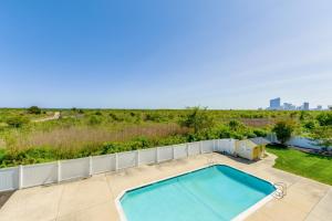 an overhead view of a swimming pool in a backyard at Atlantic City Area Vacation Rental with Pool Access! in Brigantine