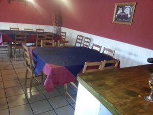A restaurant or other place to eat at Albergue San Pelayo