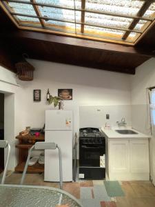 Η κουζίνα ή μικρή κουζίνα στο Los abuelos