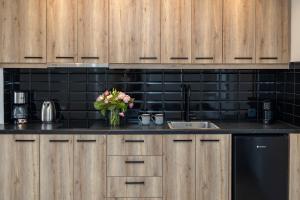 A kitchen or kitchenette at Depalyma Suites